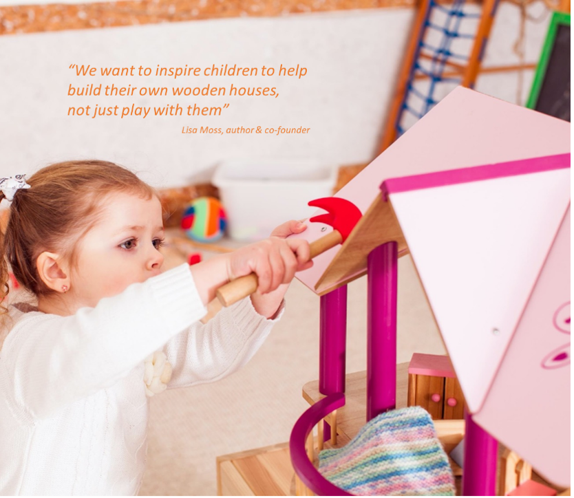 Girl playing with a wooden house